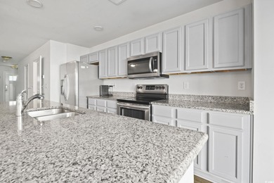 Welcome to this beautifully maintained 3-bedroom, 2.5-bath on Wild Wing Plantation in South Carolina - for sale on GolfHomes.com, golf home, golf lot