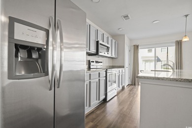 Welcome to this beautifully maintained 3-bedroom, 2.5-bath on Wild Wing Plantation in South Carolina - for sale on GolfHomes.com, golf home, golf lot