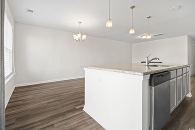 Welcome to this beautifully maintained 3-bedroom, 2.5-bath on Wild Wing Plantation in South Carolina - for sale on GolfHomes.com, golf home, golf lot