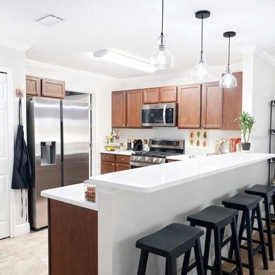 This 2 bedroom, 2 bath concrete block & stucco villa with on Arlington Ridge Golf Club in Florida - for sale on GolfHomes.com, golf home, golf lot