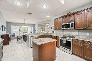 2 BEDROOMS AND A DEN............NEW ROOF.............IMPACT on Caloosa Greens Executive Golf Course in Florida - for sale on GolfHomes.com, golf home, golf lot