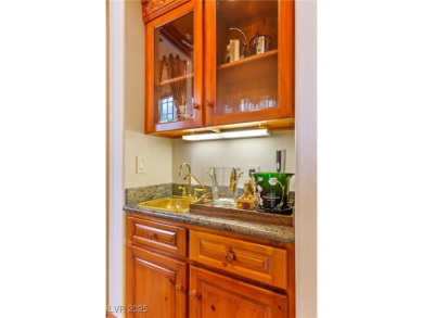 Live elegantly in this fully furnished/turnkey on Spanish Trail Golf and Country Club in Nevada - for sale on GolfHomes.com, golf home, golf lot