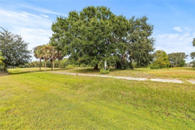 2 BEDROOMS AND A DEN............NEW ROOF.............IMPACT on Caloosa Greens Executive Golf Course in Florida - for sale on GolfHomes.com, golf home, golf lot