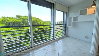 Embrace the vibrant 55+ lifestyle in South Florida's best-kept on Wynmoor Golf Course in Florida - for sale on GolfHomes.com, golf home, golf lot