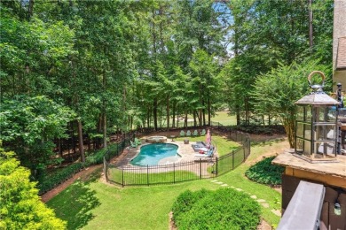 Welcome to a rare blend of luxury, comfort, and natural on Towne Lake Hills Golf Club in Georgia - for sale on GolfHomes.com, golf home, golf lot