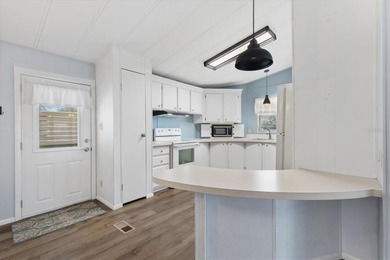 One or more photo(s) has been virtually staged. THE BEAUTIFUL on El Diablo Executive Golf Course in Florida - for sale on GolfHomes.com, golf home, golf lot