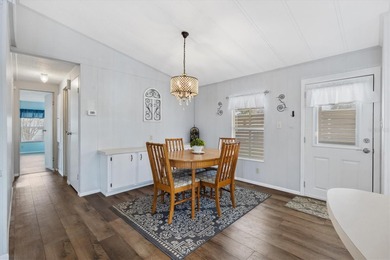 One or more photo(s) has been virtually staged. THE BEAUTIFUL on El Diablo Executive Golf Course in Florida - for sale on GolfHomes.com, golf home, golf lot