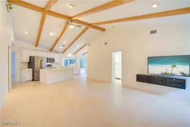 Welcome to 16597 Bear Cub Court, a stunning custom-designed home on The Forest Country Club in Florida - for sale on GolfHomes.com, golf home, golf lot