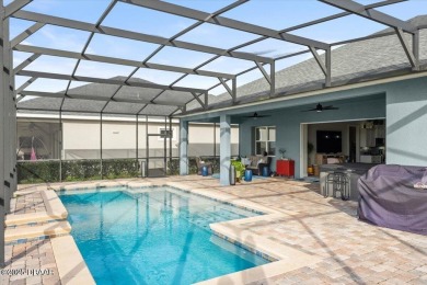 This exquisite pool home is ideally located on a lush golf on Venetian Bay Golf Course in Florida - for sale on GolfHomes.com, golf home, golf lot