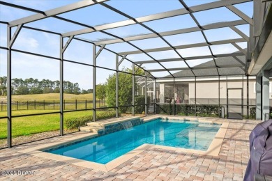 This exquisite pool home is ideally located on a lush golf on Venetian Bay Golf Course in Florida - for sale on GolfHomes.com, golf home, golf lot