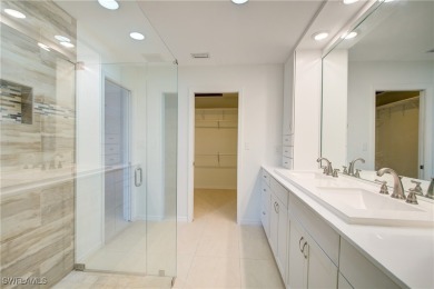 Welcome to 16597 Bear Cub Court, a stunning custom-designed home on The Forest Country Club in Florida - for sale on GolfHomes.com, golf home, golf lot