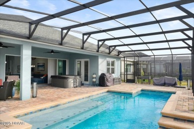 This exquisite pool home is ideally located on a lush golf on Venetian Bay Golf Course in Florida - for sale on GolfHomes.com, golf home, golf lot