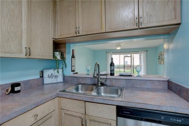 Incredible price reduction! Enjoy this 2 bedroom/2 bath condo on Pelican Pointe 9 Hole Course in Florida - for sale on GolfHomes.com, golf home, golf lot