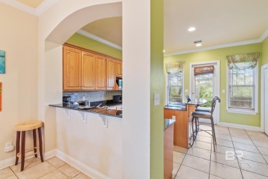 Welcome to 9359 Tartane Way, a 1,960-square-foot Caribbean-style on Kiva Dunes Golf Club in Alabama - for sale on GolfHomes.com, golf home, golf lot