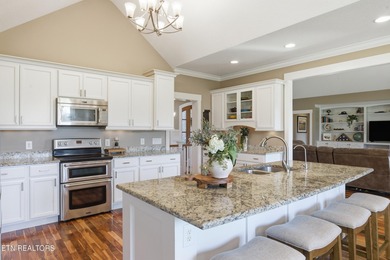 Perched along the 11th fairway of Ruggles Ferry Golf Club, this on Ruggles Ferry Golf Club in Tennessee - for sale on GolfHomes.com, golf home, golf lot