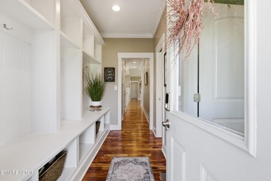 Perched along the 11th fairway of Ruggles Ferry Golf Club, this on Ruggles Ferry Golf Club in Tennessee - for sale on GolfHomes.com, golf home, golf lot