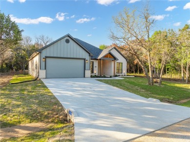 New Reduced price.  Builder is motivated.   This beauty home is on White Bluff Resort - New Course in Texas - for sale on GolfHomes.com, golf home, golf lot