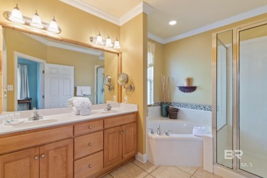 Welcome to 9359 Tartane Way, a 1,960-square-foot Caribbean-style on Kiva Dunes Golf Club in Alabama - for sale on GolfHomes.com, golf home, golf lot