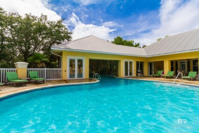 Welcome to 9359 Tartane Way, a 1,960-square-foot Caribbean-style on Kiva Dunes Golf Club in Alabama - for sale on GolfHomes.com, golf home, golf lot