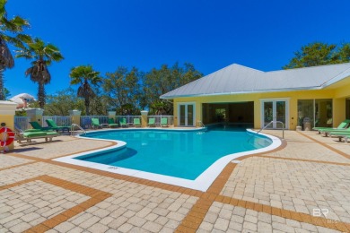 Welcome to 9359 Tartane Way, a 1,960-square-foot Caribbean-style on Kiva Dunes Golf Club in Alabama - for sale on GolfHomes.com, golf home, golf lot