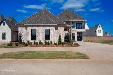 This breathtaking two story home blends modern French country on The Golf Club At StoneBridge in Louisiana - for sale on GolfHomes.com, golf home, golf lot