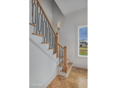 This breathtaking two story home blends modern French country on The Golf Club At StoneBridge in Louisiana - for sale on GolfHomes.com, golf home, golf lot