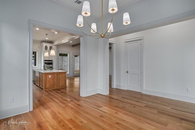 This breathtaking two story home blends modern French country on The Golf Club At StoneBridge in Louisiana - for sale on GolfHomes.com, golf home, golf lot