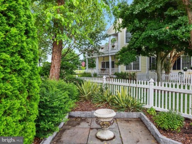 Welcome to 24960 Pot Bunker Way-an exceptional end-unit townhome on Baywood Greens Golf Club in Delaware - for sale on GolfHomes.com, golf home, golf lot