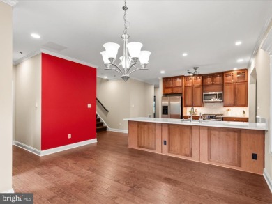 Welcome to 24960 Pot Bunker Way-an exceptional end-unit townhome on Baywood Greens Golf Club in Delaware - for sale on GolfHomes.com, golf home, golf lot