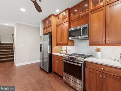 Welcome to 24960 Pot Bunker Way-an exceptional end-unit townhome on Baywood Greens Golf Club in Delaware - for sale on GolfHomes.com, golf home, golf lot