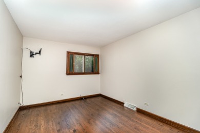 Beautifully updated 4-level split in Oak Meadows offering nearly on St. Andrews Golf and Country Club in Illinois - for sale on GolfHomes.com, golf home, golf lot