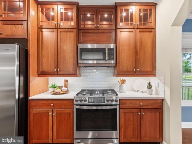Welcome to 24960 Pot Bunker Way-an exceptional end-unit townhome on Baywood Greens Golf Club in Delaware - for sale on GolfHomes.com, golf home, golf lot