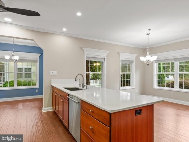 Welcome to 24960 Pot Bunker Way-an exceptional end-unit townhome on Baywood Greens Golf Club in Delaware - for sale on GolfHomes.com, golf home, golf lot