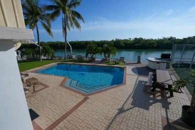 GOLFERS AND BOATERS DELIGHT! Enjoy the fantastic views of Boot on Sombrero Golf and Country Club in Florida - for sale on GolfHomes.com, golf home, golf lot