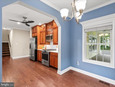 Welcome to 24960 Pot Bunker Way-an exceptional end-unit townhome on Baywood Greens Golf Club in Delaware - for sale on GolfHomes.com, golf home, golf lot