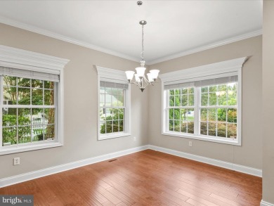 Welcome to 24960 Pot Bunker Way-an exceptional end-unit townhome on Baywood Greens Golf Club in Delaware - for sale on GolfHomes.com, golf home, golf lot