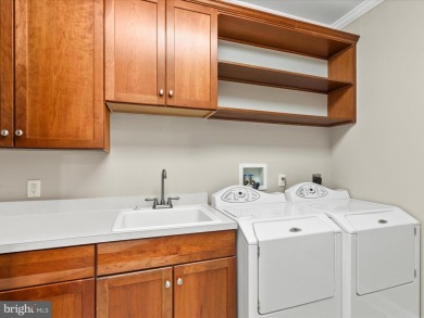 Welcome to 24960 Pot Bunker Way-an exceptional end-unit townhome on Baywood Greens Golf Club in Delaware - for sale on GolfHomes.com, golf home, golf lot