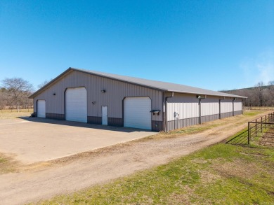 A RIVER RUNS THROUGH IT!!Located approx. 27 mi SE of Waldron on  in Arkansas - for sale on GolfHomes.com, golf home, golf lot