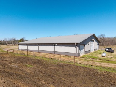 A RIVER RUNS THROUGH IT!!Located approx. 27 mi SE of Waldron on  in Arkansas - for sale on GolfHomes.com, golf home, golf lot