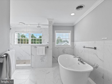Welcome to 24960 Pot Bunker Way-an exceptional end-unit townhome on Baywood Greens Golf Club in Delaware - for sale on GolfHomes.com, golf home, golf lot