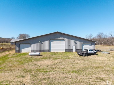 A RIVER RUNS THROUGH IT!!Located approx. 27 mi SE of Waldron on  in Arkansas - for sale on GolfHomes.com, golf home, golf lot