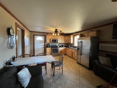 A RIVER RUNS THROUGH IT!!Located approx. 27 mi SE of Waldron on  in Arkansas - for sale on GolfHomes.com, golf home, golf lot