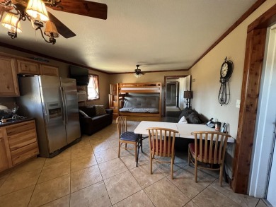 A RIVER RUNS THROUGH IT!!Located approx. 27 mi SE of Waldron on  in Arkansas - for sale on GolfHomes.com, golf home, golf lot