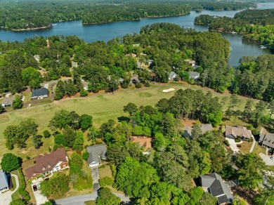 Drive down a tree-lined driveway to this quiet oasis located on on Monticello Golf Club At Savannah Lakes in South Carolina - for sale on GolfHomes.com, golf home, golf lot