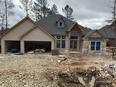 Experience lake living in this beautiful new construction home on Granada Golf Course in Arkansas - for sale on GolfHomes.com, golf home, golf lot