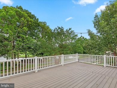 Welcome to 24960 Pot Bunker Way-an exceptional end-unit townhome on Baywood Greens Golf Club in Delaware - for sale on GolfHomes.com, golf home, golf lot