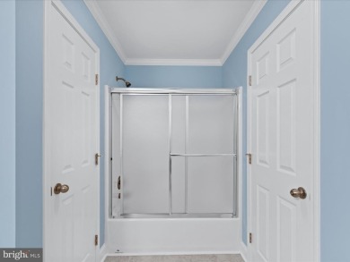 Welcome to 24960 Pot Bunker Way-an exceptional end-unit townhome on Baywood Greens Golf Club in Delaware - for sale on GolfHomes.com, golf home, golf lot