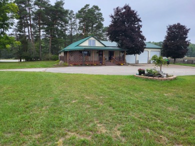 Family owned since 1955, the Marvel's 4D Ranch is legendary in on St. Ives Golf Club in Michigan - for sale on GolfHomes.com, golf home, golf lot