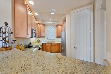 Panoramic 7th-floor views of the championship golf course on Vineyards Golf and Country Club in Florida - for sale on GolfHomes.com, golf home, golf lot