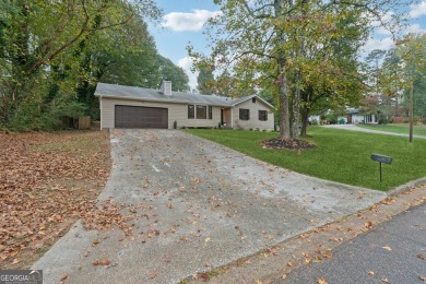 This renovated 3-bedroom, 2-bathroom home offers modern living on Mystery Valley Golf Course in Georgia - for sale on GolfHomes.com, golf home, golf lot